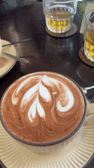 Morning coffee with latte art served in Nha Trang cafe