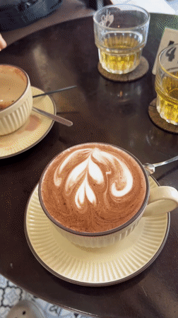 Morning coffee with latte art served in Nha Trang cafe