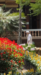 Tourists visit flower gardens and temple grounds in Da Lat