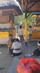 Hindu ceremony captured at Balinese temple in Denpasar