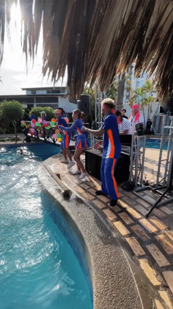 Coordinated poolside dance performance in Porlamar, Venezuela