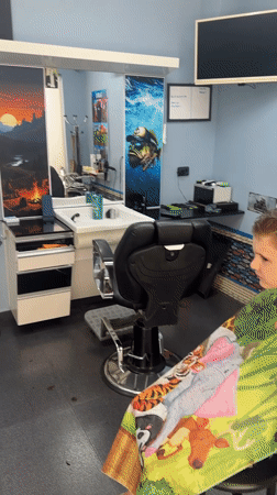 Customer serenades barbershop with music during haircut in Turkey