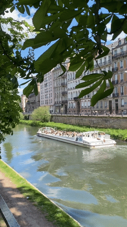 Tour boat carries passengers through Strasbourg canal