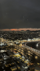 Nighttime aerial view of Mexico City captured from airplane