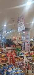 Supermarket in full swing — shopping, restocking, and checkout in Kartasura