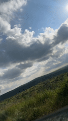 Vehicle passenger films countryside scenery near Konstantinovo, Bulgaria