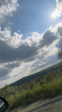 Vehicle passenger films countryside scenery near Konstantinovo, Bulgaria