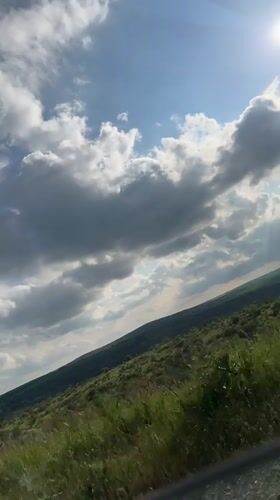 Vehicle passenger films countryside scenery near Konstantinovo, Bulgaria
