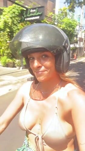 Bali beach morning: kites, jukungs, banyan trees, and shore life