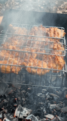 Rural gathering involves grilling, wood handling in Elovo, Russia
