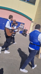Street band performs outdoors in Saarbrücken on sunny morning