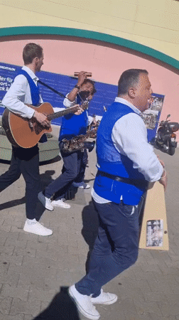 Street band performs outdoors in Saarbrücken on sunny morning