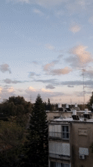 Sunset observed over residential Ramat Gan