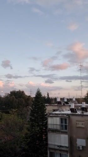 Sunset observed over residential Ramat Gan