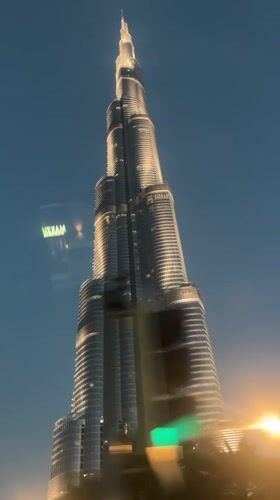 Evening stroll through Dubai's luxury district captured near Burj Khalifa