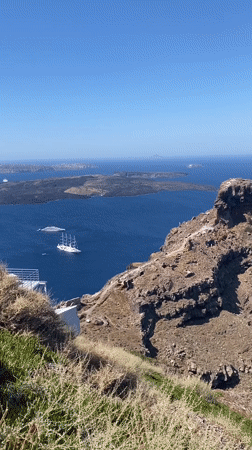 Santorini caldera views: bell tower, tall-ship, and cruise vessels