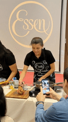 Cooking demonstration held in Tacna Peru with multiple participants