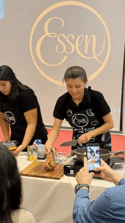 Cooking demonstration held in Tacna Peru with multiple participants