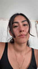 Woman shares dinner time with cats at Puebla home