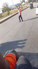 Street scene recorded from vehicle in Bukuru, Nigeria