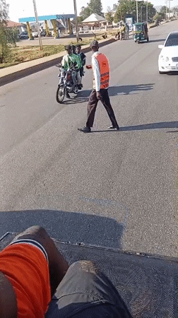 Street scene recorded from vehicle in Bukuru, Nigeria