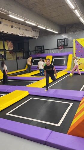 Children play at indoor trampoline park in Shumen