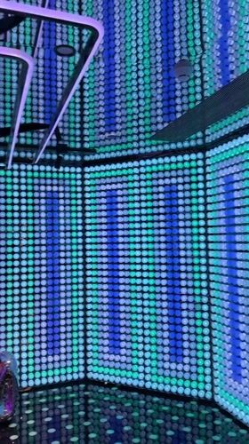 Luxury mall in Nanjing with immersive LED corridors and high-end retail