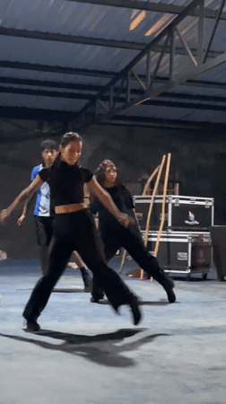Dance crew rehearses in a Porlamar warehouse studio
