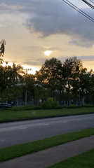 Sunset road view and security interaction captured in Đồng Nai