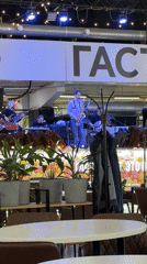 Band performs live music in food court setting
