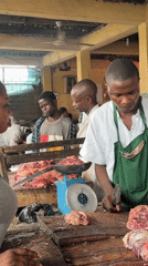 Lagos market life: butchers, vendors, and goods on the move