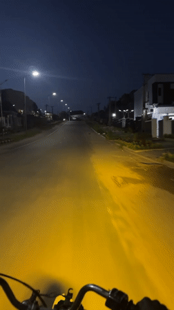 Nighttime motorcycle journey documented on Guzape road