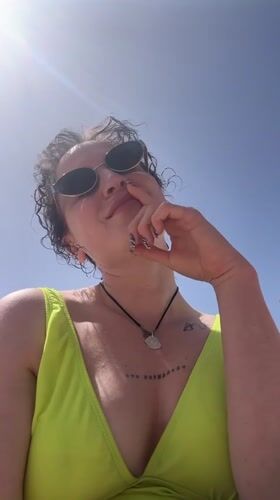 Woman enjoys sunny morning at Netanya Beach