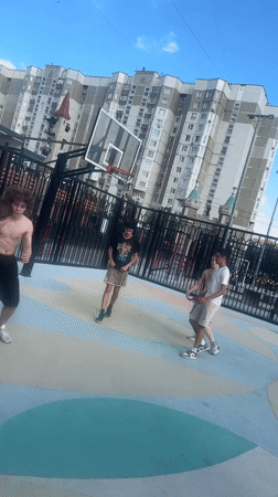 Outdoor activity in a Moscow residential district on a summer afternoon