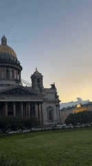 St. Petersburg at dusk, cathedral dome and river under late evening sky