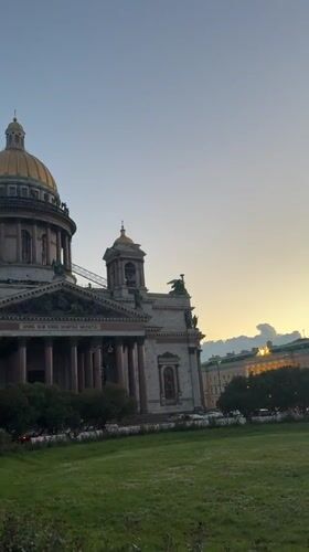 St. Petersburg at dusk, cathedral dome and river under late evening sky
