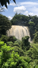 Muddy waterfall and temple details from central Vietnam highlands
