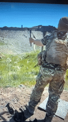 Armed individuals in camouflage documented at unknown location