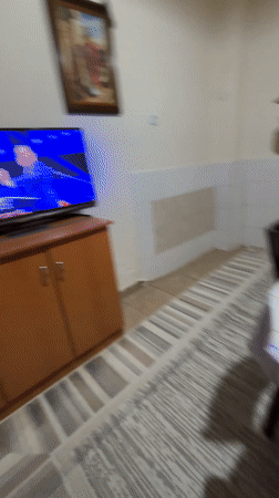 Family plays board game in Karlovo, Bulgaria