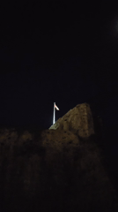 Night scenes captured of illuminated fortress and church in Budva