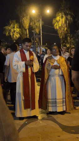 Nighttime religious procession draws crowds in Ancón, Peru
