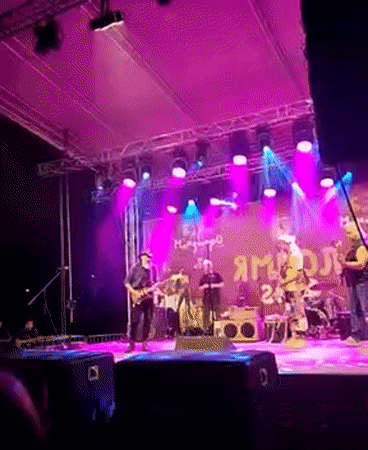 Live band performance at outdoor evening event in Yambol
