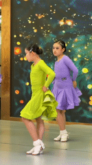 Young dancers perform cultural routines in Jiulongpo District