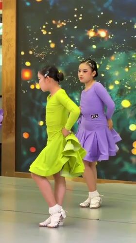 Young dancers perform cultural routines in Jiulongpo District