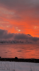 Red sunrise captured over Norwegian waters near Straumsbukta