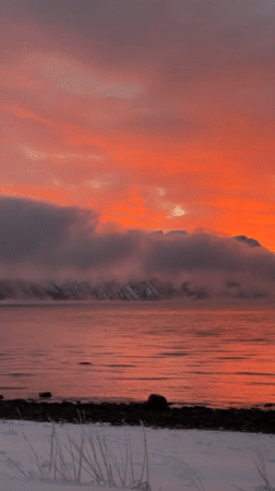 Red sunrise captured over Norwegian waters near Straumsbukta