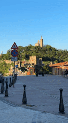 Tourists visit medieval fortress plaza in Veliko Tarnovo