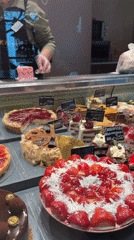 Bakery display case showcased fresh pastries in Sochi