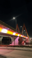 Illuminated cable-stayed bridge captured at night in Kazan
