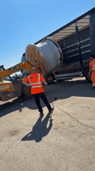 Construction crew unloads material spool in Smyadovo Bulgaria